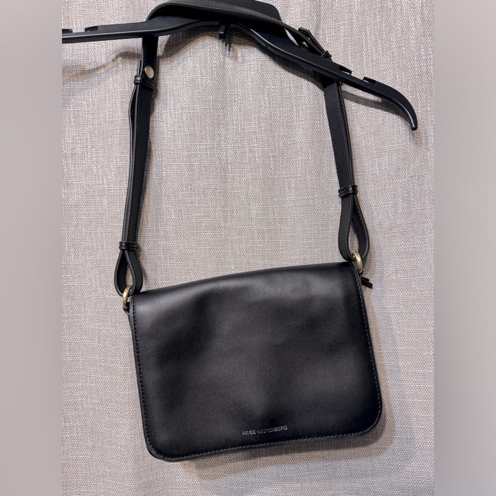 Aimee Kestenberg black leather purse with leopard print trim and stud details